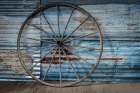 Still-life on a ranch. Wagon wheel. Art Print
